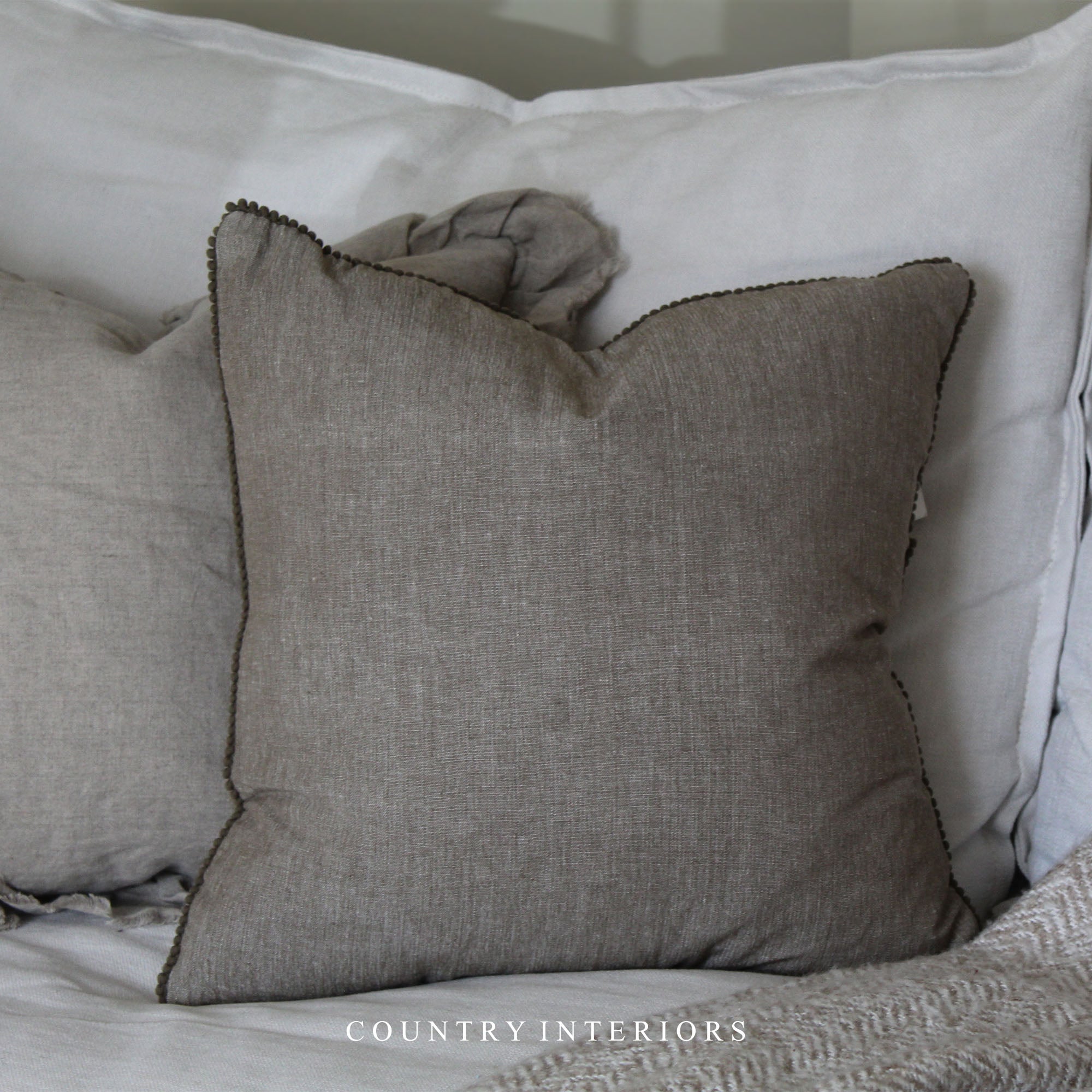 Pom Pom Trim Cushion in Sage Green 45x45cm Country Interiors